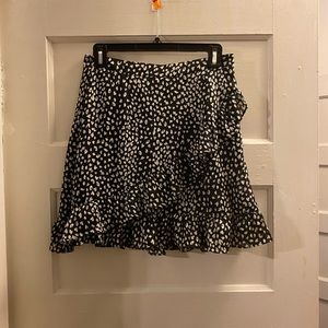 Black and white ruffled mini skirt